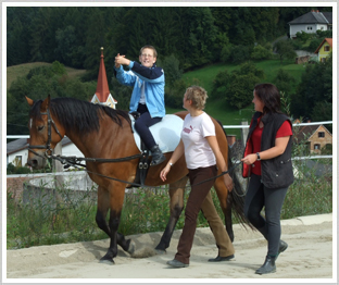 reiten bub klatscht